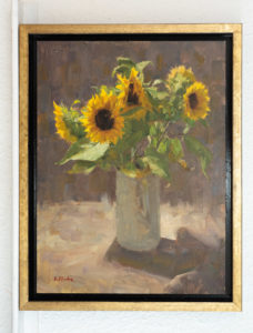 Backlit sunflower framed